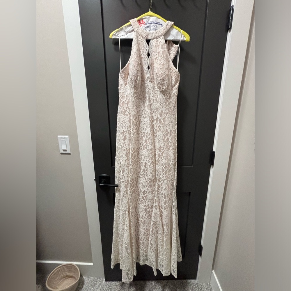 Can be worn for prom or a wedding. Size 12.